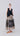 Front view of beige midi skirt with elastic waist and contrasting baroque damask print, elegant fit