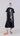 Front view of Psophía embroidered poplin midi dress featuring a cheongsam-style neckline, short sleeves, and vertical floral embroidery with subtle sequin detailing.