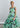 Botanic Soft Flow dress Psophía SS26 front view with asymmetrical overlay, square neckline and fluid silhouette