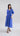 Lunar Breeze midi dress Psophía SS26 front view with V-neck, empire waist and lightweight flowy fabric.