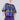 Psophía SS26 Retro Prism blouse with ruched neckline, vibrant geometric print and modern cropped silhouette