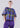 Psophía SS26 Retro Prism blouse with ruched neckline, vibrant geometric print and modern cropped silhouette
