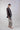 Side view of the Tropic Sketch tailored pants showing straight leg, light structure and fluid poplin drape.