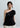 Asymmetric one-shoulder mercerized cotton T-shirt with cascading rosette detail and sculptural draped neckline.
