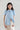Front view of candy stripe oxford shirt showing puff sleeves and twin front openings.