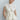 Main view of an embroidered Tencel ring-neck blouse with a fluid silhouette, airy volume and an elegant, contemporary feel.