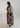 Back view of Orchid Canvas Button-Front Midi Dress in ochre floral satin cotton with relaxed volume and clean round neckline.