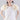 Front view of Psophía poplin short-sleeve top with round neckline and floral embellished sleeves.