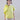 Front view of wide mercerized cotton T-shirt featuring short sleeves, soft luminosity, and sculptural rosette on the shoulder.