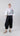 Front view of Psophía SS26 women’s wide-leg balloon pants in Black, designed with an elasticated waist and contemporary balloon volume.