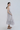 Vestido midi de rayas hand painted con tirantes lazada y volante evasé